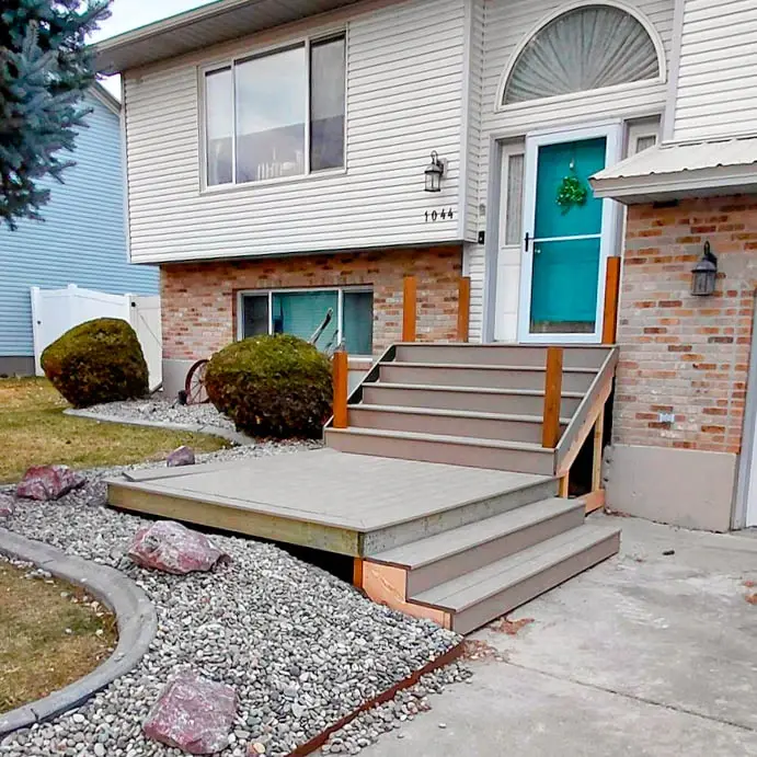 Installation of new grey composite deck boards and entry stairs by DeckPro LLC in Rexburg, ID.