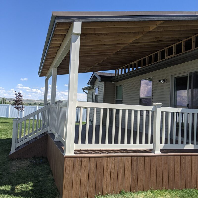 Elevate your outdoor living with DeckPro LLC’s signature Wide-Span Open-Ceiling Attached Covered Composite Deck & Stairway project. This comprehensive installation transforms your backyard into a sophisticated, all-weather retreat. Featuring premium brown composite decking boards with a rich wood-grain texture and robust, low-maintenance light-tan vinyl railings, this spacious platform offers years of maintenance-free relaxation.