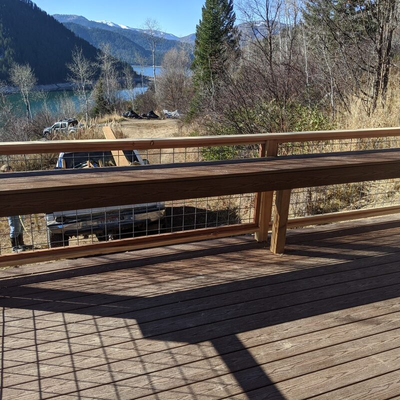 Expand your multi-level outdoor living with this dramatic before and after pool area transformation by DeckPro LLC. Pictured on a partly cloudy day, the build shows our transition from a challenging construction site with exposed dirt and framing to a massive and inviting custom composite deck and travertine paver oasis. This vast, raised retreat seamlessly connects an elevated two-story beige siding home to a luxurious in-ground pool area with a covered patio and built-in hot tub surround, creating defined sun and shade areas optimized for multi-directional natural views. Featuring durable two-tone gray and warm wood composite decking paired with sleek dark metal railings, this functional sanctuary is perfect for relaxation and large-scale entertaining. Direct access via existing sliding glass doors makes indoor-outdoor living effortless.