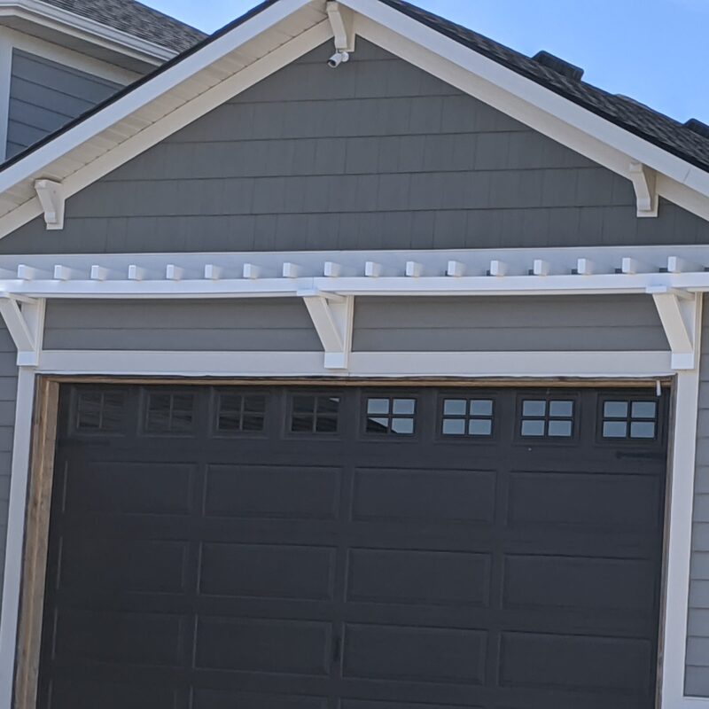 Expand your multi-level outdoor living with this massive backyard transformation by DeckPro LLC, pictured here in a transition from winter to spring. Pictured on a beautiful sunny day, the build shows our seamless transition from raw construction site to fully-finished sanctuary. The extensive new multi-level composite decks feature integrated privacy screening and covered sections complete with recessed lighting, defining functional zones perfect for swimming, sunbathing, dining, and relaxation, with direct indoor-outdoor access. We installed high-quality composite decking in a modern grey tone, paired with safe and sophisticated dark vertical perimeter railings, creating a sturdy retreat. The 'After' view reveals expansive stairs leading to a concrete patio level and beautifully integrated hot tub surround with functional under-deck enclosed storage, creating a truly unique tranquil sanctuary perfect for large properties.