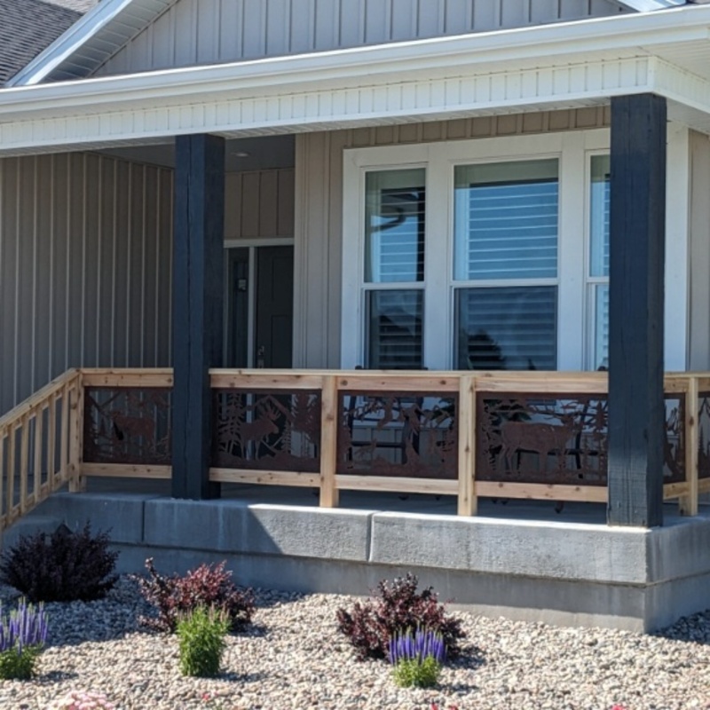 Elevate your home's curb appeal with a durable and low-maintenance vinyl railing system. This project features a classic white vinyl railing with vertical balusters, perfectly complementing the modern stone veneer facade. The sturdy white vinyl columns provide essential support for the porch overhang while matching the sleek railing, creating a unified and inviting entrance.